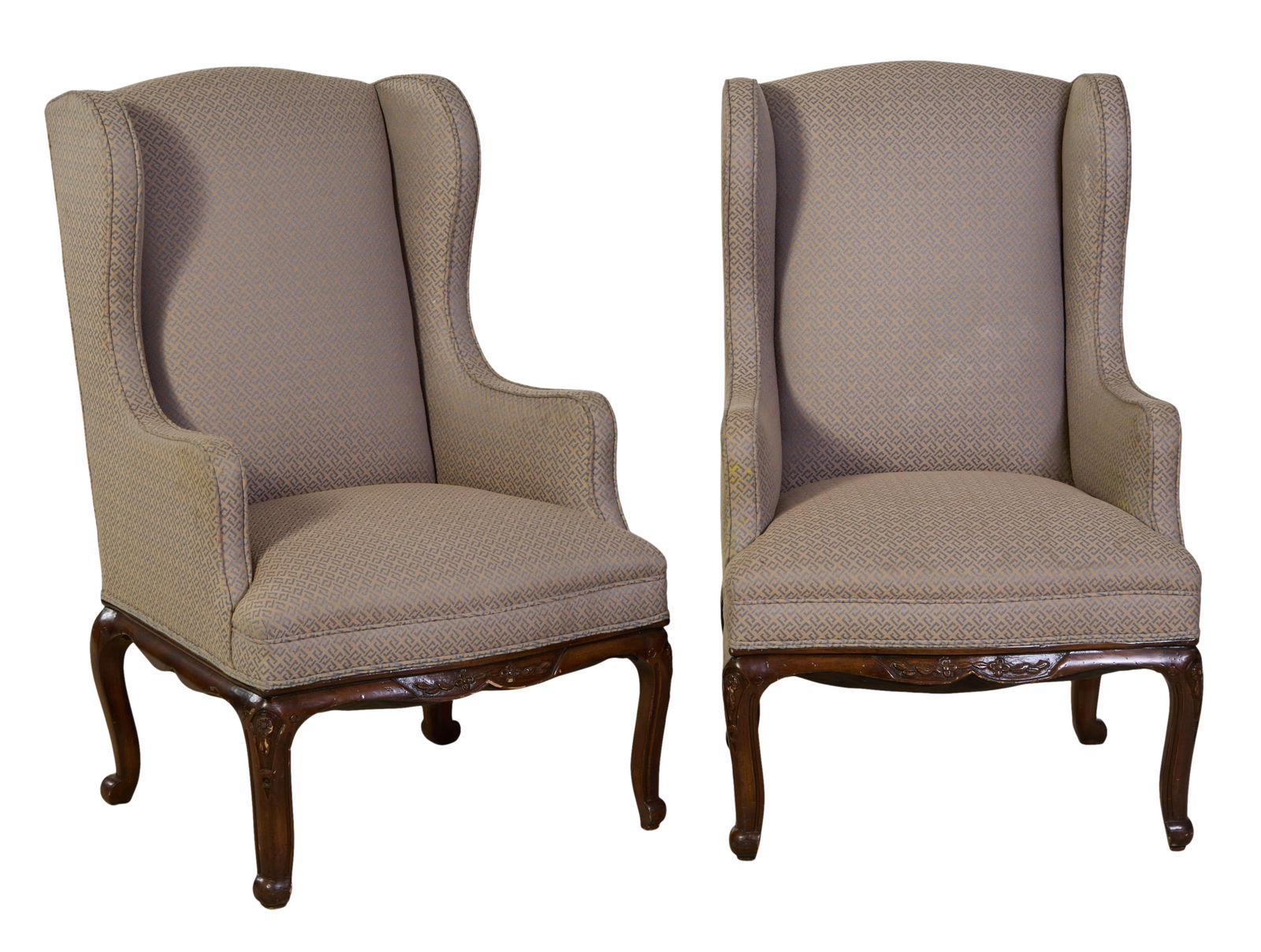 Pair of Louis XV Inspired Wing Chairs, 20th c., Each- H.- 42 in., W.- 24 in., D.- 23 in. (2 Pcs.): Pair of Louis XV Inspired Wing Chairs, 20th c., the arched back into restrained wings and arms, carved seat rail joining cabriole legs with floral carved knees, Each- H.- 42 in., W.- 24 in., D.- 23 in