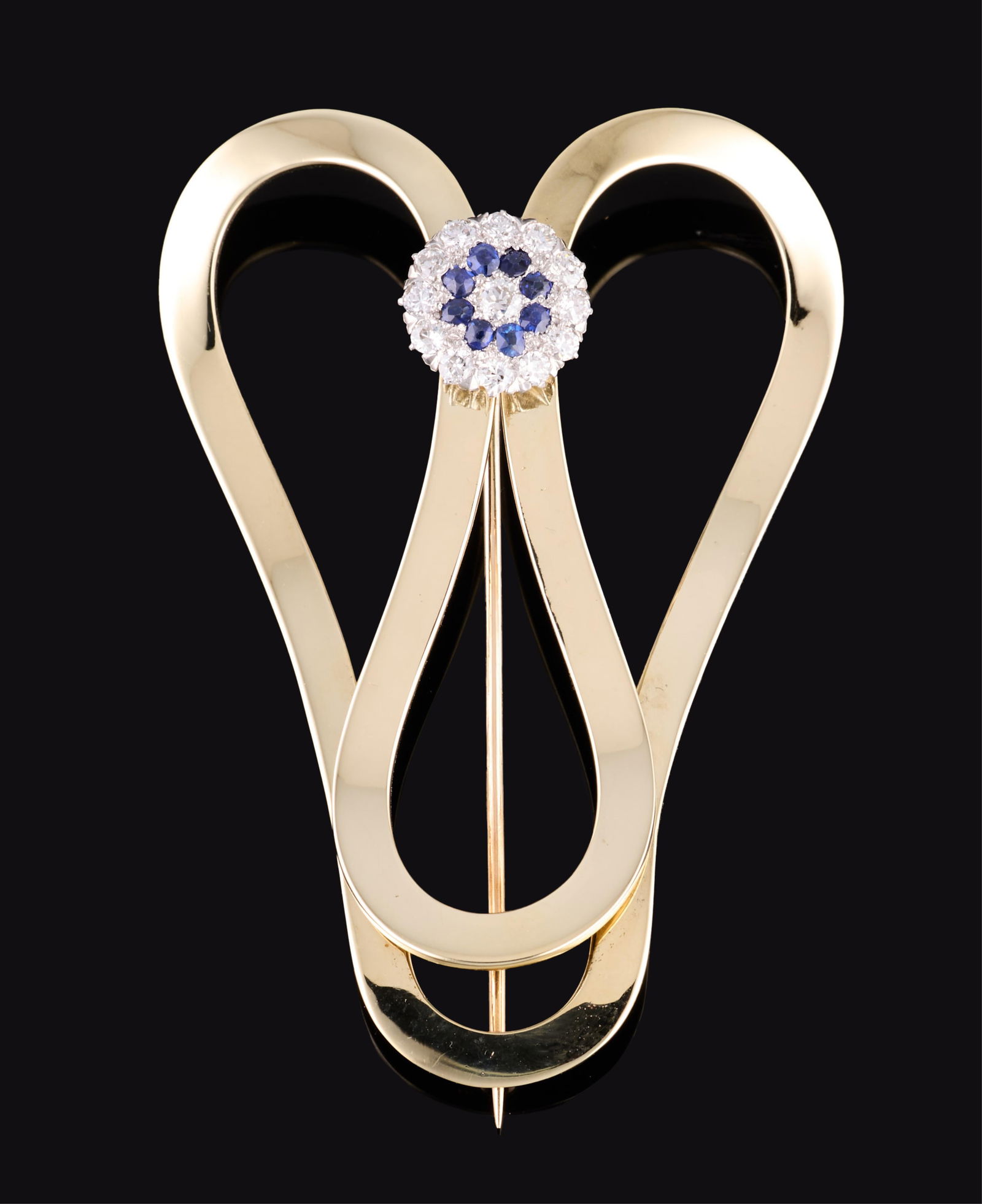 14K Yellow Gold Diamond and Sapphire Brooch, App. Wt.- 21.99 grams; H.- 2 1/2 in., W.- 1 3/4 in.: 14K Yellow Gold Diamond and Sapphire Brooch, with approximately 0.95 carat total weight of round brilliant cut diamonds and 0.25 carat total weight of round single-cut sapphires in a abstract-form set