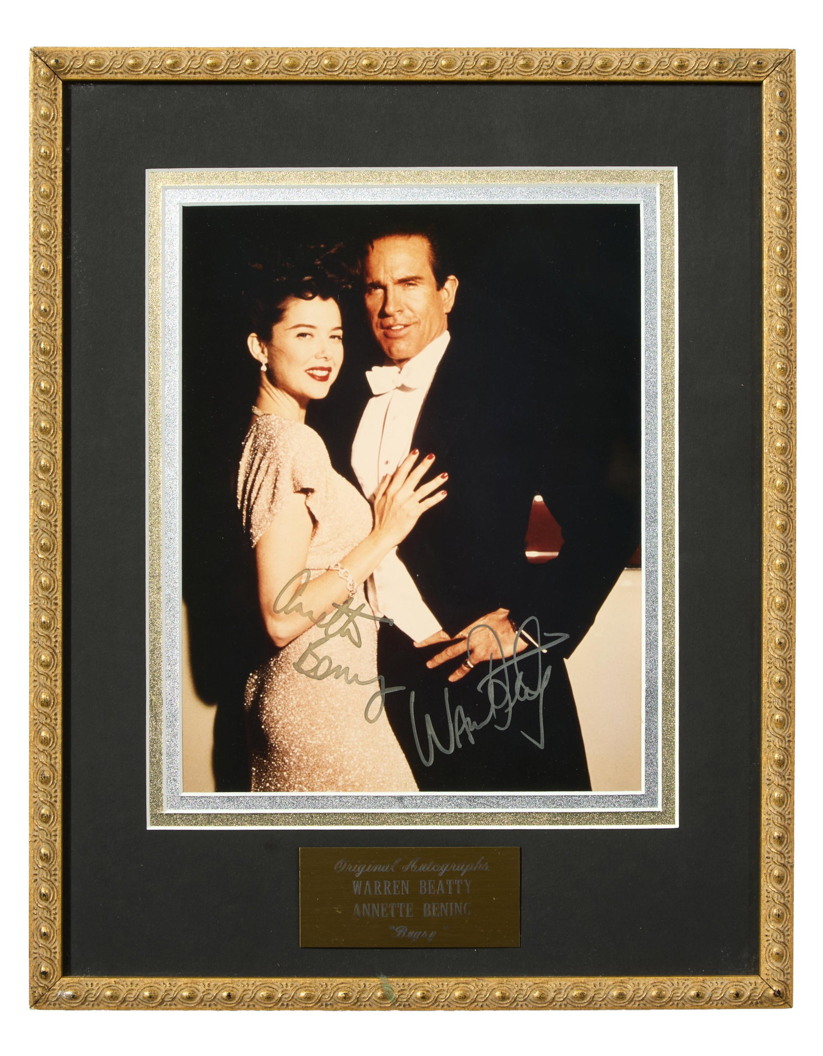 Warren Beatty and Annette Benning Autographed Memorabilia from "Bugsy" (1991), Overall- H.- 9 in.,: Warren Beatty and Annette Benning Autographed Memorabilia from "Bugsy" (1991), with color photo of the pair on set, signed by both Beatty and Benning, presented with a gilt actors plaque, in a wood fr