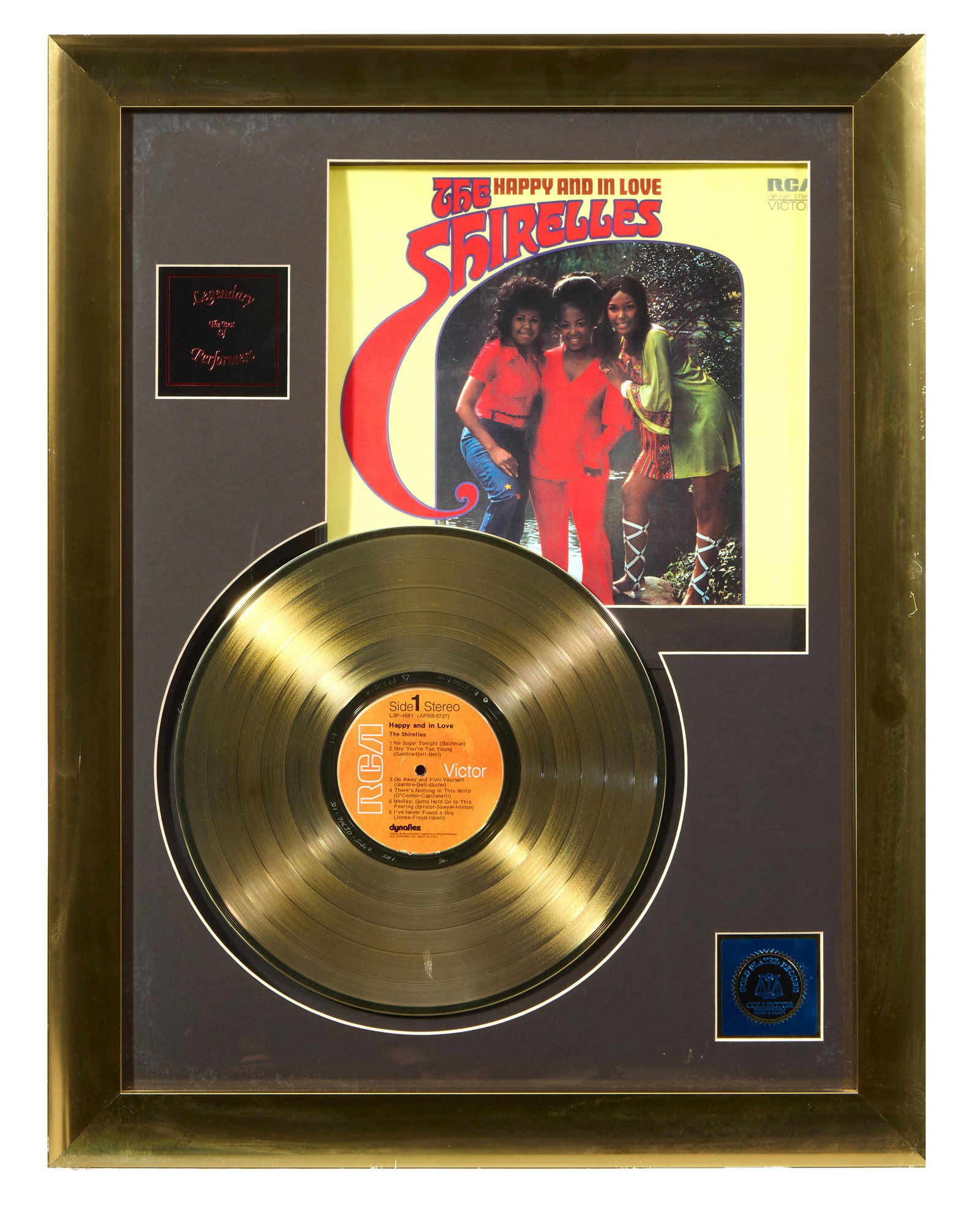 The Shirelles Rock and Roll Memorabilia, Overall- H.- 27 in., W.- 21 in.: The Shirelles Rock and Roll Memorabilia, with 24 karat gold plated RCA Records LP, and a laminate copy of the album cover, in a gilt metal frame, Overall- H.- 27 in., W.- 21 in.