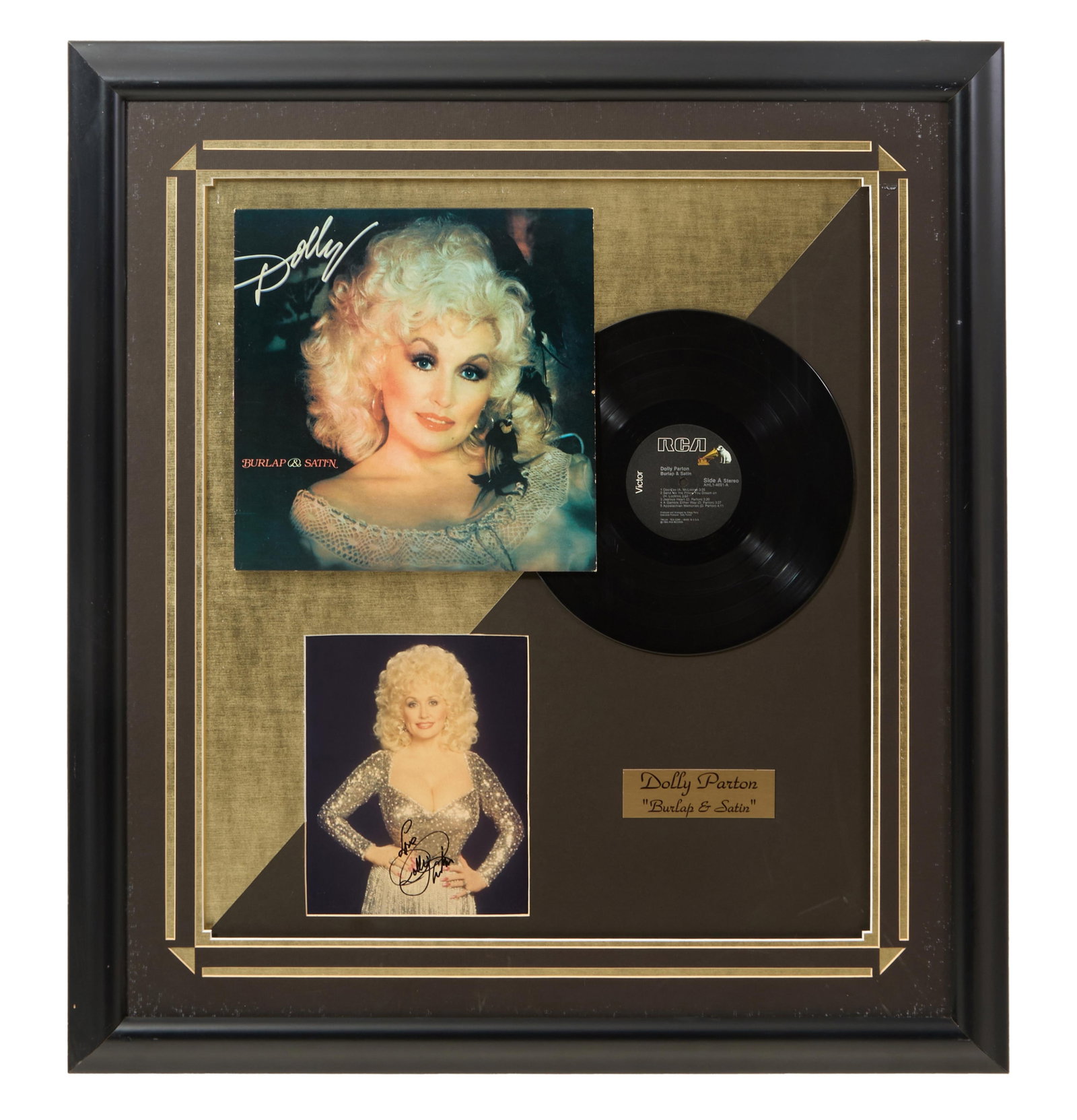 Dolly Parton Autographed Memorabilia, Overall- H.- 36 in., W.- 32 1/2 in.: Dolly Parton Autographed Memorabilia, with "Burlap and Satin" Victor Records LP and album cover, presented with a gilt plaque and two color photographs of Parton, the smaller signed, in a black frame 