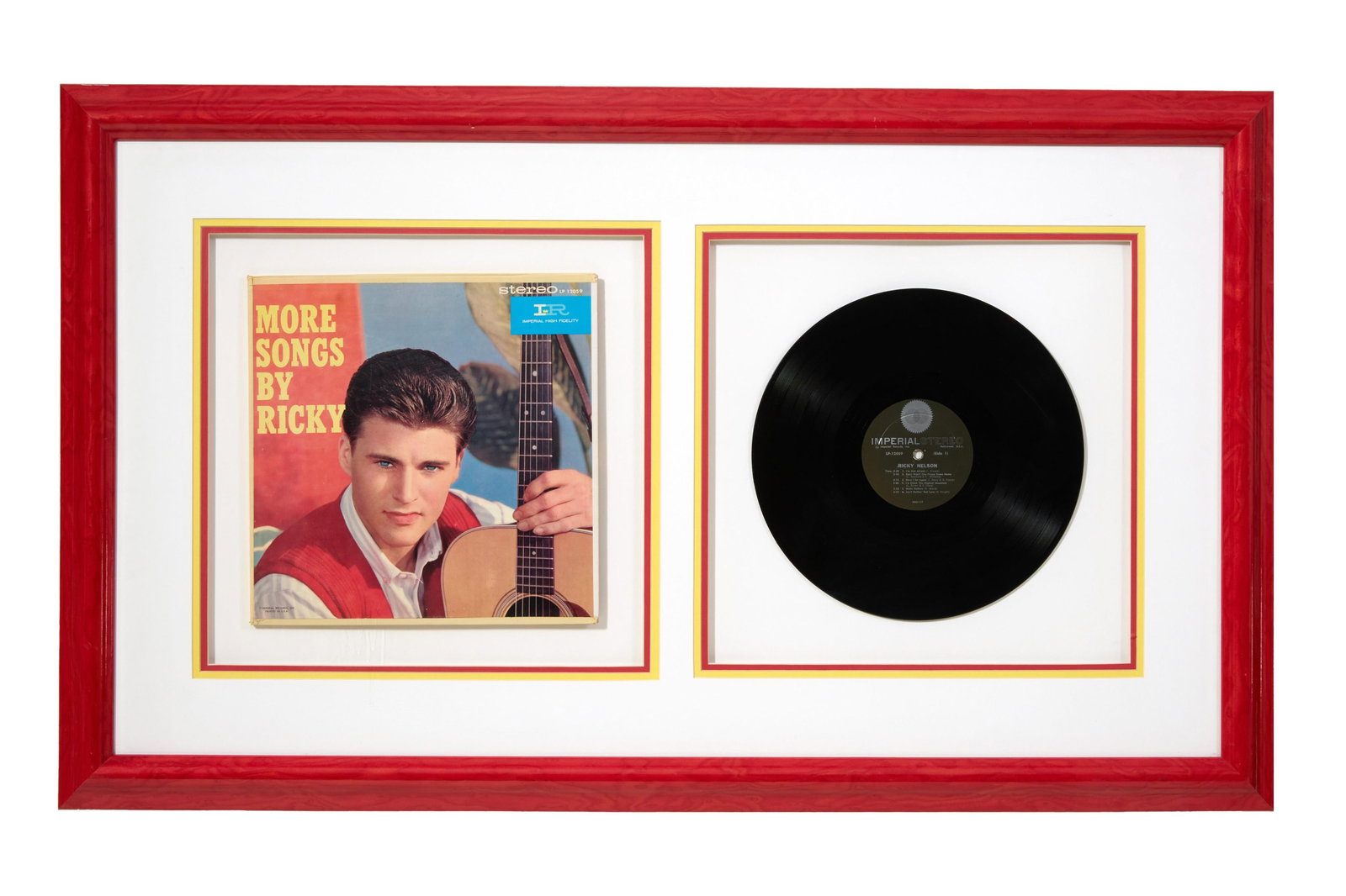 Ricky Nelson Music Memorabilia, Overall- H.- 25 3/4 in., W.- 43 3/4 in.: Ricky Nelson Music Memorabilia, with Imperial Records "More Songs by Ricky" LP and album cover, presented in a red frame with plexiglass, Overall- H.- 25 3/4 in., W.- 43 3/4 in.