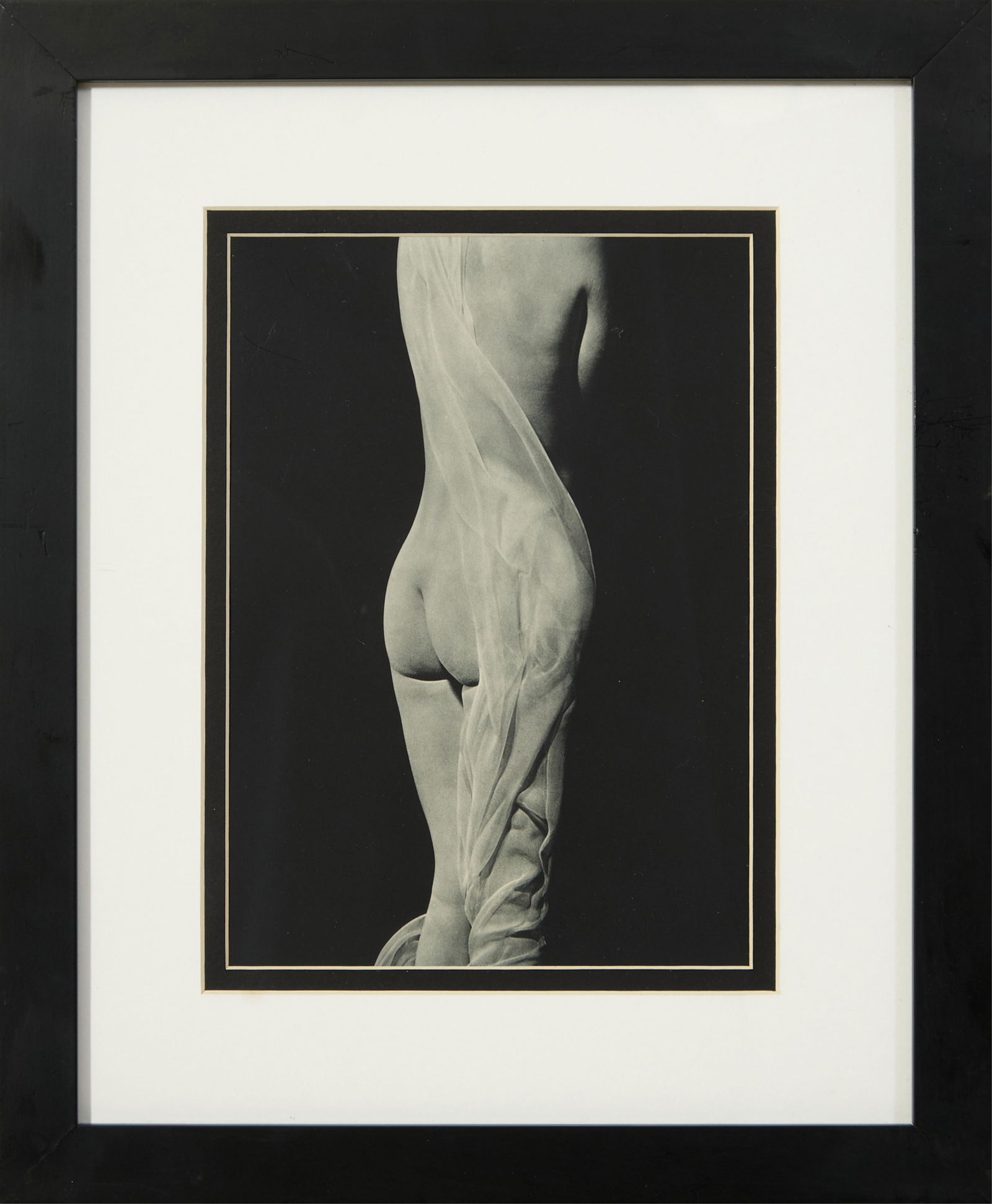Attributed to Erwin Blumenfeld (German/American, 1897-1969),"Female Nude from the Rear in Sheer: Attributed to Erwin Blumenfeld (German/American, 1897-1969),"Female Nude from the Rear in Sheer Drapery," photogravure on paper, unsigned, presented in a black wood frame, with a Certificate of Authen