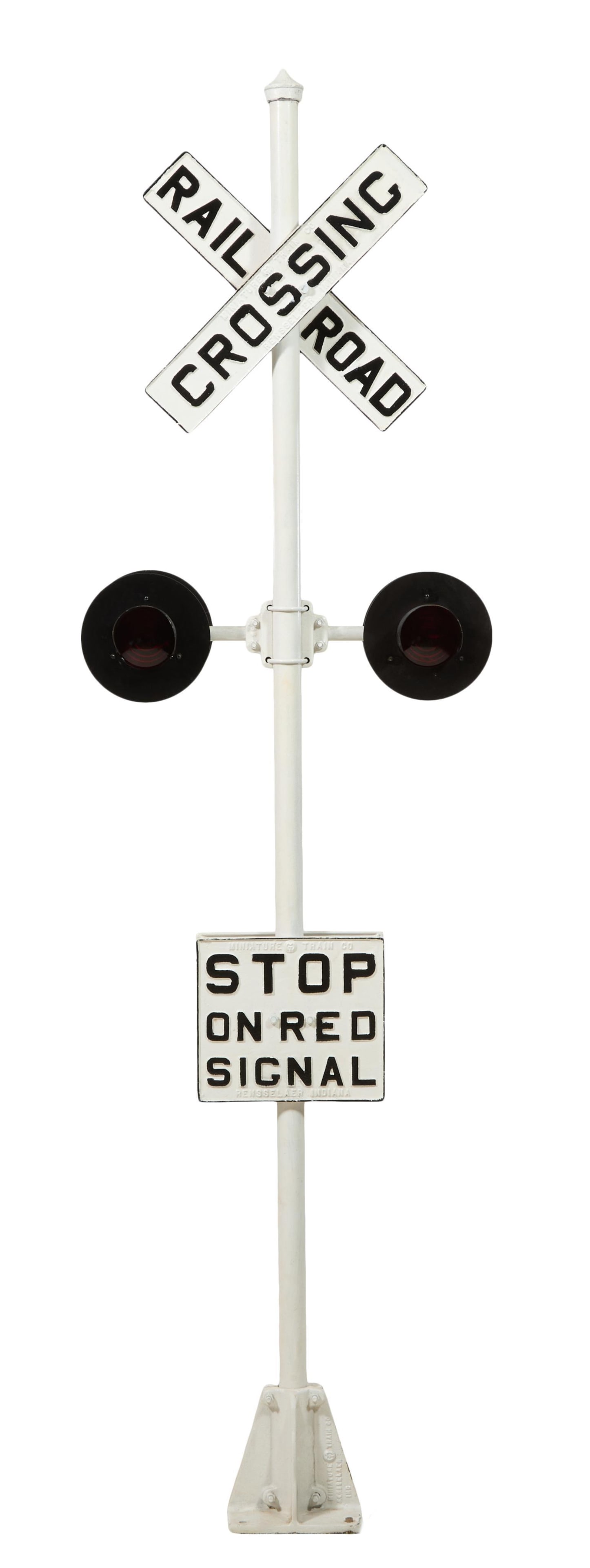 Cast Iron "Railroad Crossing" Electrified Warning Sign, 20th c., H.- 97 1/2 in., W.- 27 1/2 in., D.-: Cast Iron "Railroad Crossing" Electrified Warning Sign, 20th c., manufactured by the Miniature Train Co., Rensselaer, Indiana, the lower sign 'Stop on Red Signal," with four red lights, H.- 97 1/2 in.