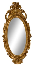 Large French Rococo Giltwood Oval Over Mantel Mirror, late 19th c., H.- 68 in., W.- 35