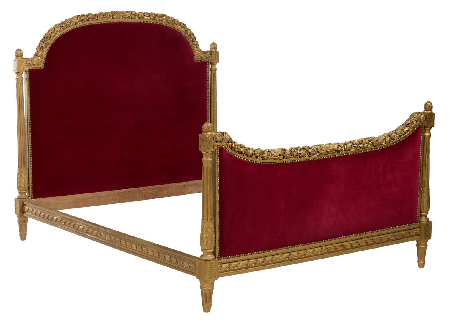 French Louis XVI Style Carved Giltwood Bed, late 19th c., Headboard- H.- 55 in. W.- 57 in.,: French Louis XVI Style Carved Giltwood Bed, late 19th c., the arched upholstered headboard with gilt relief carved fruit and foliate garland, flanked by finialed reverse tapered fluted columnar stiles