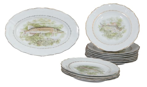 Thirteen Piece French Ceramic Fish Set, 20th c., Plates- H.- 1 in., Dia.- 9 1/2 in. (13 Pcs.)
