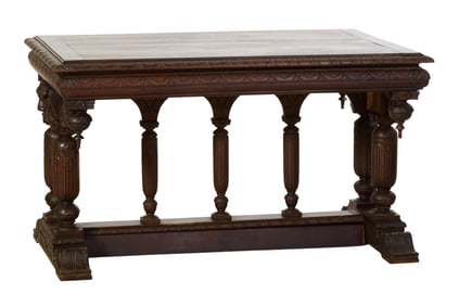 French Renaissance Style Carved Walnut Library Table, late 19th c., H.- 30 3/4 in., W.- 53 1/4 in.,