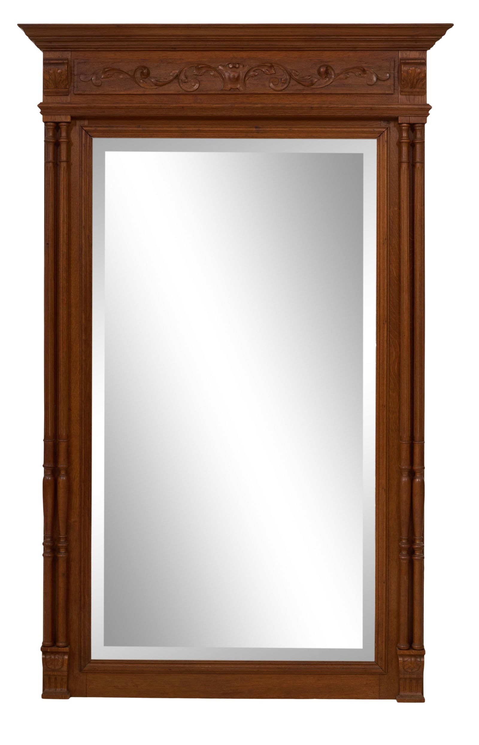 French Henry II Style Carved Walnut Overmantel Mirror, late 19th c., H.- 60 1/2 in., W.- 37 in.: French Henry II Style Carved Walnut Overmantel Mirror, late 19th c., the stepped moulded cornice over shield centered frieze with foliate acanthus scrolls, foliate bracket ends, paired ring turned flu