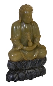Carved Jade Buddha Figure, 20th c., H.- 8 3/4 in., W.- 5 3/8 in., D.- 1 7/8 in.