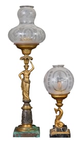 Two Gilt Bronze Solar Lamps, early to mid 19th c., Dolphin- H.- 17 3/4 in., Dia. 8 in.; Figure- H.-