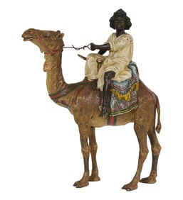 Franz Bergman (Austrian, 1838-1894), "Camel and Rider," Figure- H.- 8 3/8 in., W.- 2 1/2 in. D.- 7