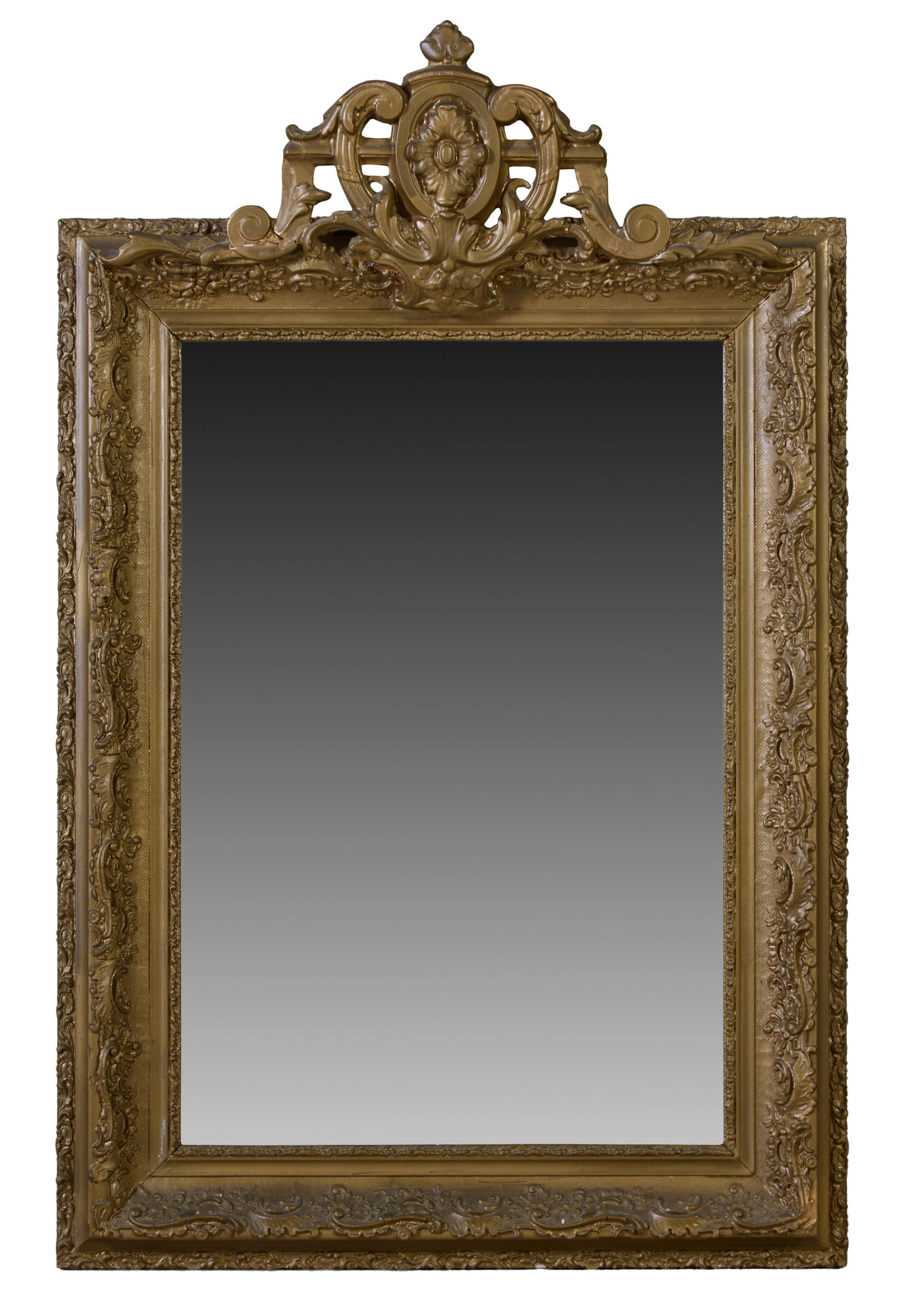 French Louis XV Style Giltwood Mirror, 20th c., H.- 40 1/2 in., W.- 25 in.: French Louis XV Style Giltwood Mirror, 20th c., the pierced crest with acanthus scrolls and over a heavily decorated frame, aged mirror plate, H.- 40 1/2 in., W.- 25 in.