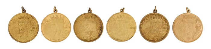 Six Mardi Gras Krewe Charms, Rex, 20th c., Total Gold Wt.- 8.9 grams; Total Sterling Wt.- 1.47 Troy