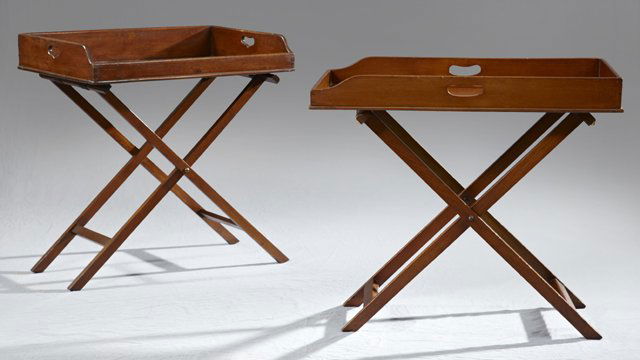 Pair of Carved Mahogany Butler's Trays, early 20th c.,: Pair of Carved Mahogany Butler's Trays, early 20th c., on folding stands, H.- 29 3/4 in., W.- 28 in., D.- 19 1/2 in.