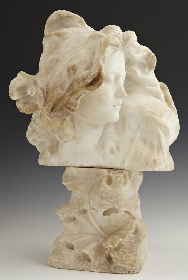 Art Nouveau Carved Alabaster Bust, c. 1900, of a beauty: Art Nouveau Carved Alabaster Bust, c. 1900, of a beauty with a flower in her hair, probably Italian, on a relief carved pedestal base, H.- 18 in., W.- 12 in., D.- 9 in.