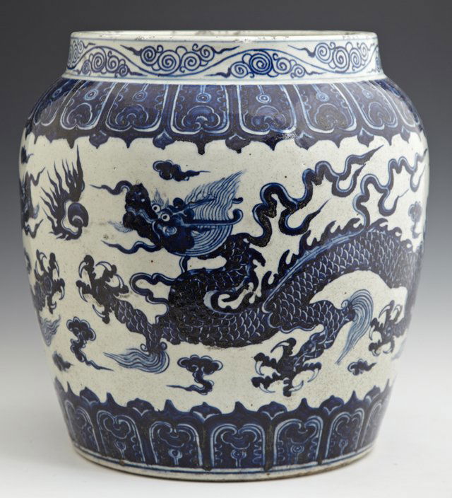 Large Chinese Blue and White Glazed Earthenware Baluste: Large Chinese Blue and White Glazed Earthenware Baluster Jar, 19th c., the sides with dragon and cloud decoration, H.- 11 7/8 in., Dia.- 13 1/2 in.