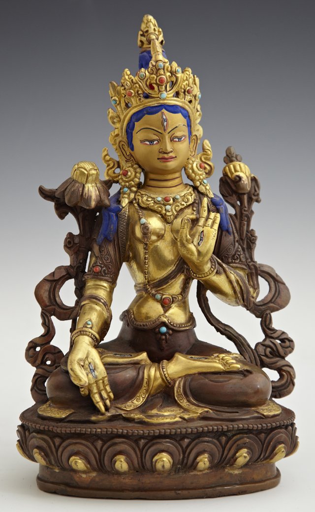 Nepalese Coral- and Turquoise-Set Parcel-Gilt Patinated: Nepalese Coral- and Turquoise-Set Parcel-Gilt Patinated and Polychromed Bronze Figure, late 19th c., in the lotus position, H.- 8-1/2 in., W.- 5 3/8 in., D.- 3 1/2 in.