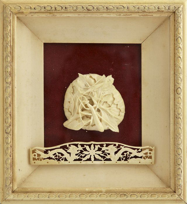 Chinese Carved Ivory Floral Relief Medallion, late 19th: Chinese Carved Ivory Floral Relief Medallion, late 19th c., of a praying mantis on a leaf, together with a pierce carved dragon panel, presented in a shadowbox frame, H.- 3 in., W.- 3 in., D.- 1 in.