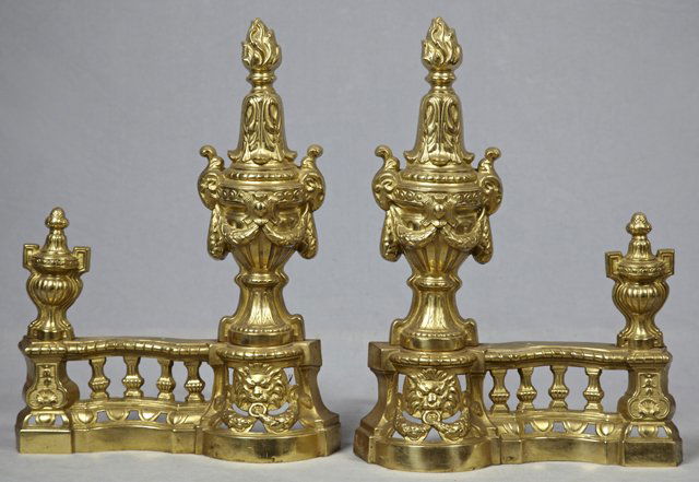 Pair of Louis XV Style Bronze Andirons, early 20th c.,: Pair of Louis XV Style Bronze Andirons, early 20th c., of relief urn form on a base with a relief lion's head, flanked by a colonnaded rail with a central urn, H.- 20 1/2 in., Each- W.- 15 in., D.- 14