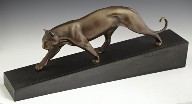 Art Deco Patinated Bronze Figure of a Panther, c. 1930,: Art Deco Patinated Bronze Figure of a Panther, c. 1930, on a sloping black marble base, H.- 9 3/4 in., W.- 24 7/8 in., D.- 4 3/4 in.