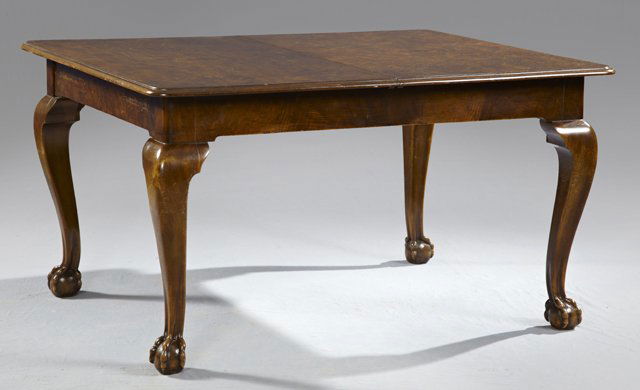 Carved Burled Walnut Chippendale Style Dining Table, ci: Carved Burled Walnut Chippendale Style Dining Table, circa 1910, with three leaves, on carved cabriole legs ending in ball and claw feet. H- 29 1/2 in., W.- Closed- 66 in, Each Leaf- 22 in., W.- Open