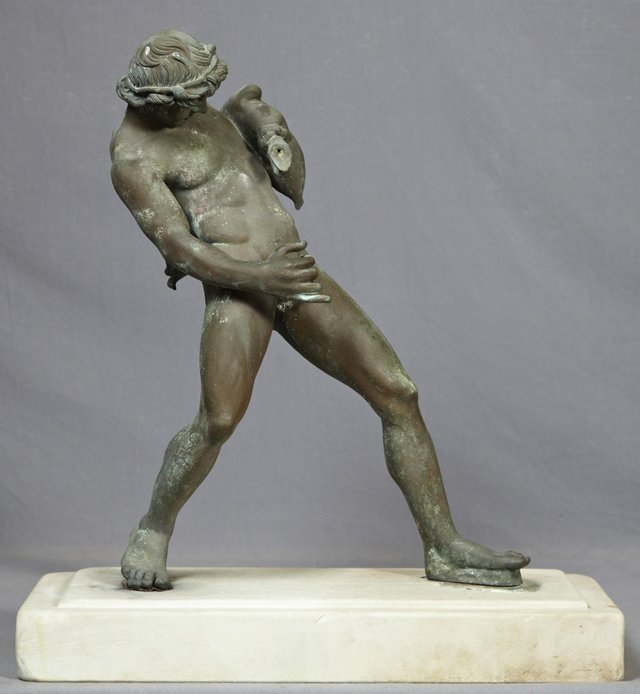 Italian "Grand Tour" Patinated Bronze Figure of Bacchus: Italian "Grand Tour" Patinated Bronze Figure of Bacchus, 19th c., the nude and drunken youthful Bacchus depicted with his wineskins, after the Antique model, presented on an oblong stepped marble base