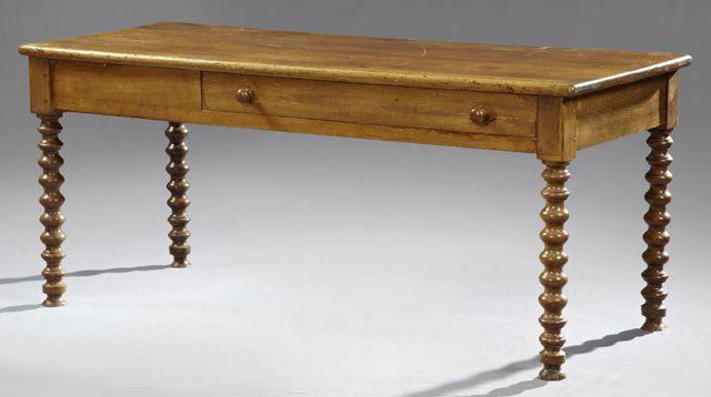 French Provincial Carved Poplar Farmhouse Table, 19th c: French Provincial Carved Poplar Farmhouse Table, 19th c., with a long frieze drawer on one side and a short one on the opposite side, on bobbin turned legs, H.- 29 1/2 in., W.- 68 1/2 in., D.- 27 1/4