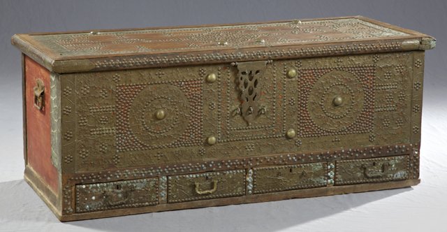 Unusual Moroccan Carved Walnut Coffer, 19th c., the top: Unusual Moroccan Carved Walnut Coffer, 19th c., the top and front with intricate brass nail decoration, the front with four shallow bottom drawers, H.- 20 1/2 in., W.- 50 1/2 in., D.- 21 in.