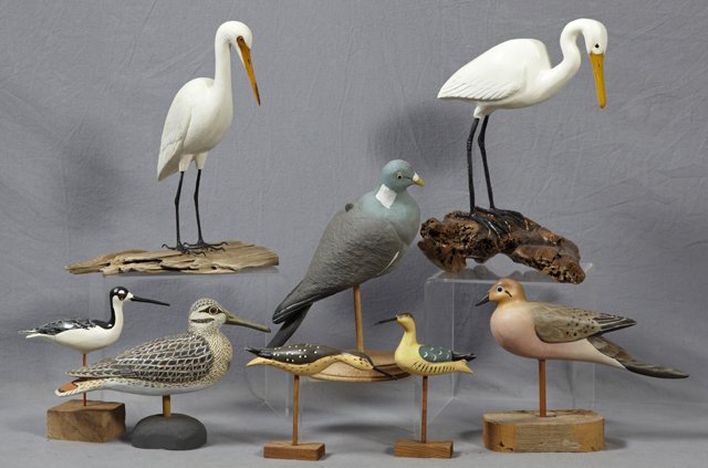 Group of Eight Bird Figures, three carved wood shorebir: Group of Eight Bird Figures, three carved wood shorebirds, a duck by Bill Lee, a duck by Laurent Verdin, a rubber pigeon decoy and two carved wood egrets, from the Collection of Charles Frank. (8 Pcs.
