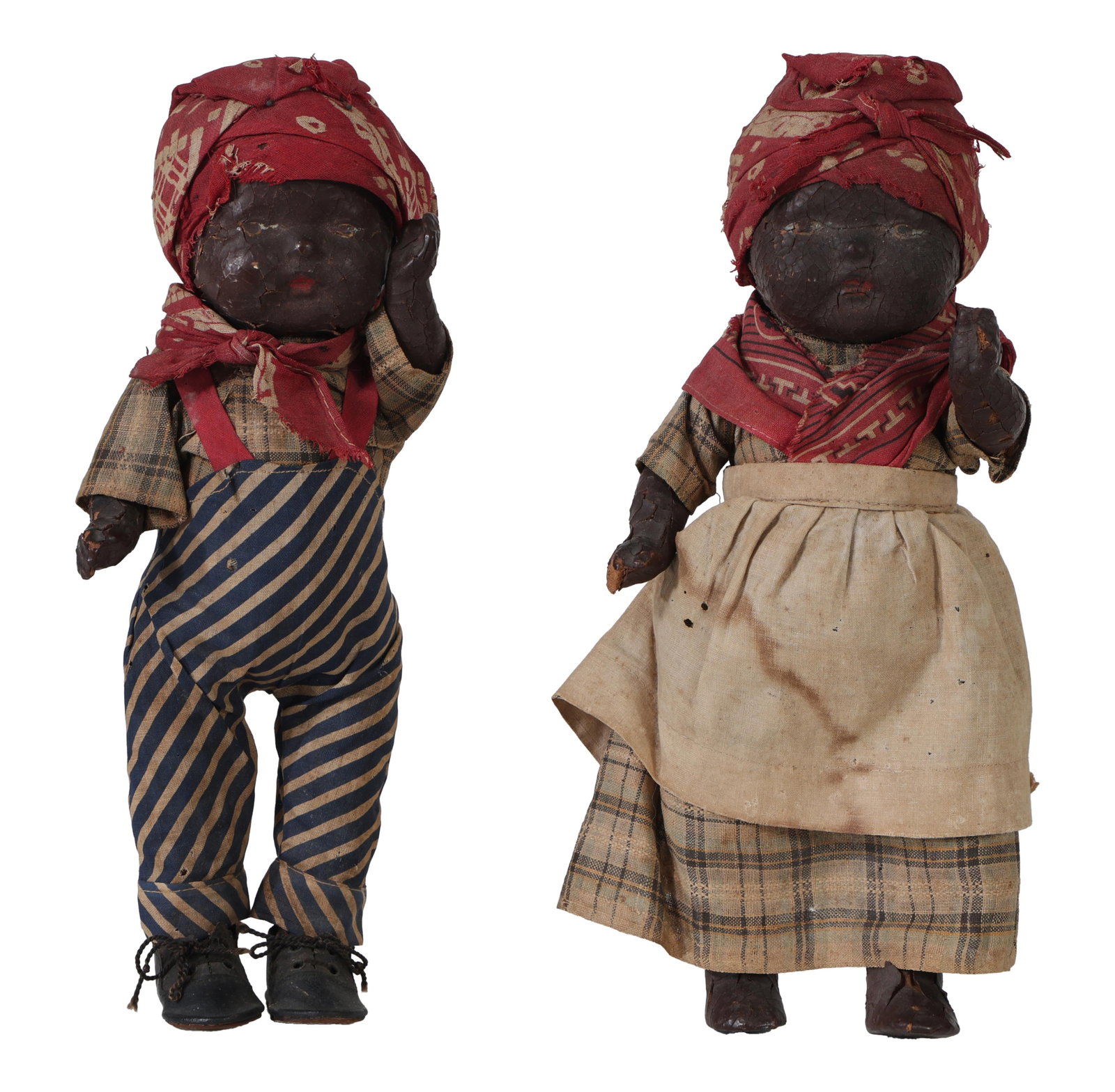 Pair of African American Folk Cloth Dolls, early 20th c., H.- 11 1/4 in., W.- 5 in., D.- 4 1/4 in.: Pair of African American Folk Cloth Dolls, early 20th c., of a male and female, in period clothes, H.- 11 1/4 in., W.- 5 in., D.- 4 1/4 in. (2 Pcs.)
