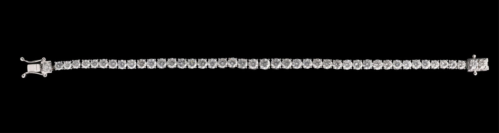 18K White Gold Tennis Bracelet, Total Diamond Wt.- 12.19 carats., L.- 7 3/4 in., with appraisal. (1 of 5)