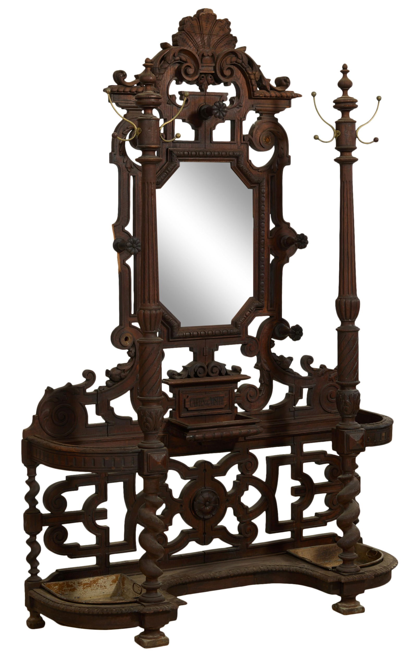 American Renaissance Carved Oak Hall Tree, late 19th c., H.- 92 in., W.- 59 in., D.- 20 in.: American Renaissance Carved Oak Hall Tree, late 19th c., ambitious shell carved broken pediment crest over mirror with egg and dart surround, two integrated reverse tapered finialed posts with hat and