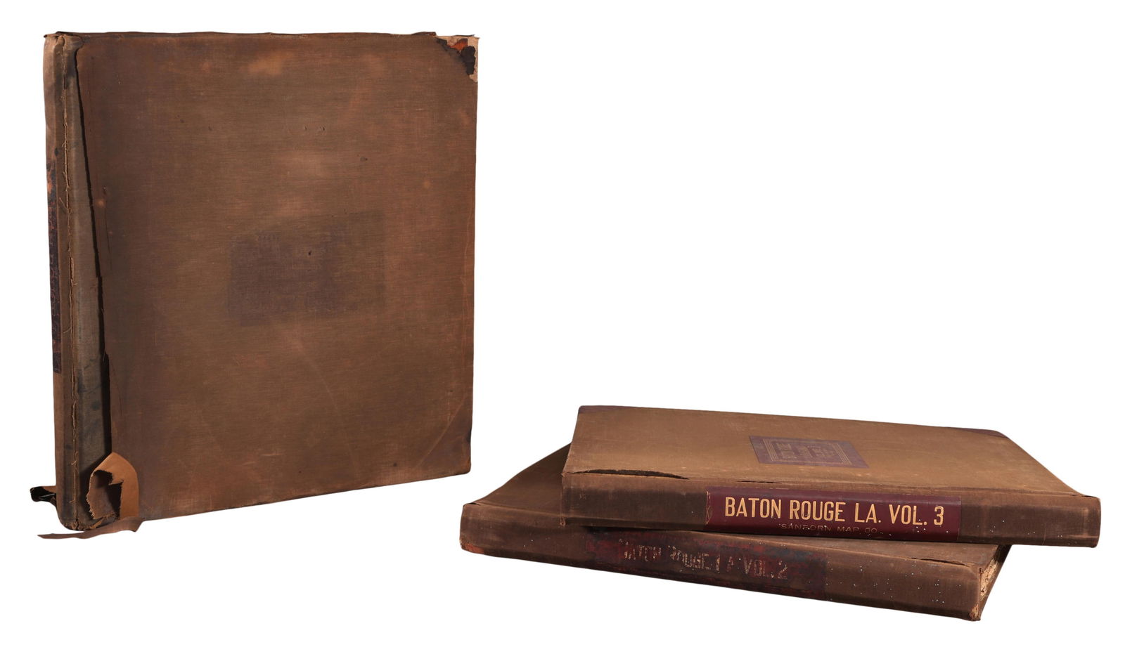 Three Sanborn Fire Insurance Maps of Baton Rouge, Bound Annals, 1923, H.- 25 1/2 in., W.- 23 1/2 in,: Three Sanborn Fire Insurance Maps of Baton Rouge, Bound Annals, 1923, consisting of 1923, volumes 1-3, with updates and corrections from 1949-1955, including a letter from the Louisiana Rating and Fir