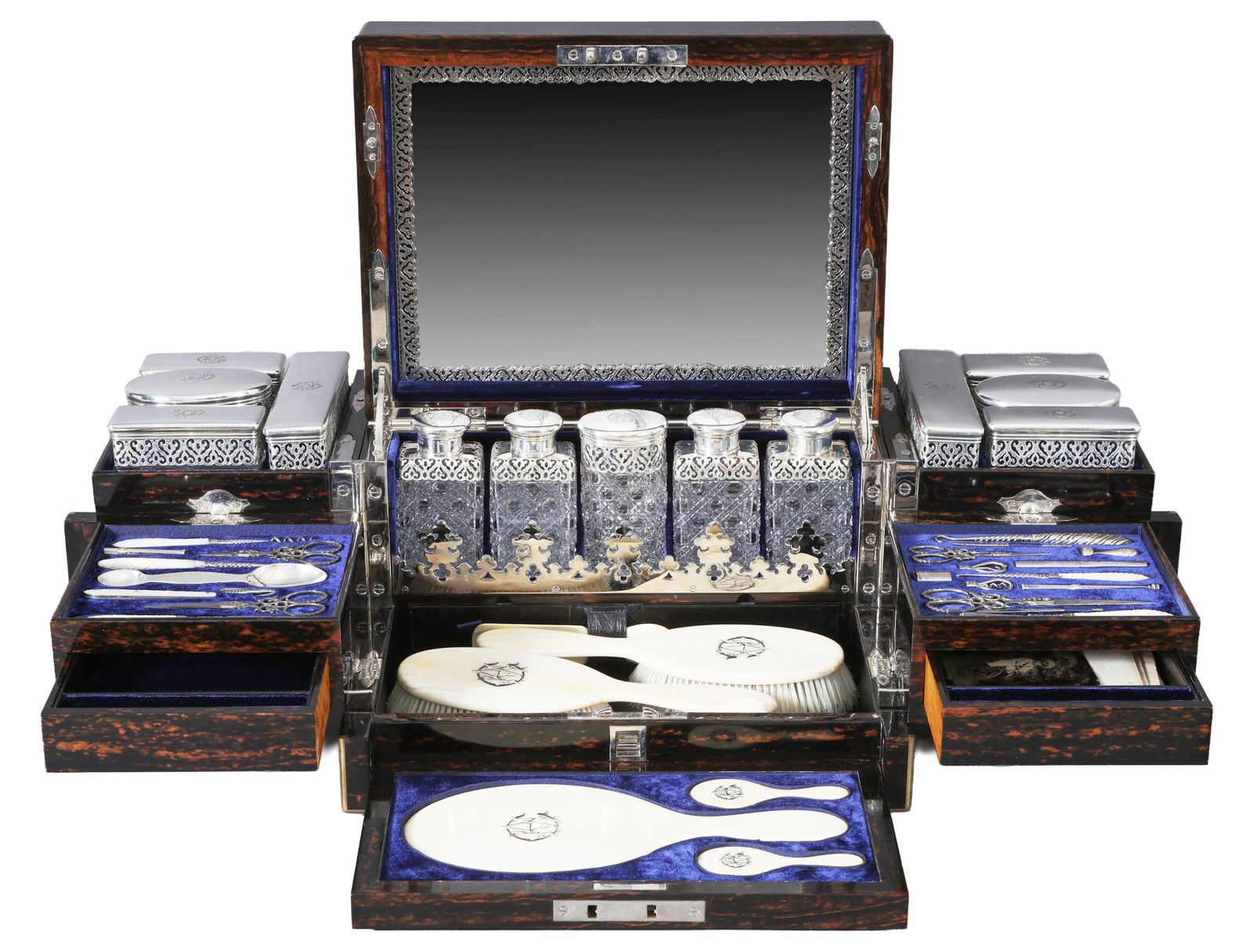 Rare Antique Coromandel Dressing Case, Jenner & Knewstub, London, 1884, with Betjemann Patent: Rare Antique Coromandel Dressing Case, Jenner & Knewstub, London, 1884, with Betjemann Patent Mechanisms, the case veneered in coromandel and edged in brass, the interior fitted with ruched blue velve