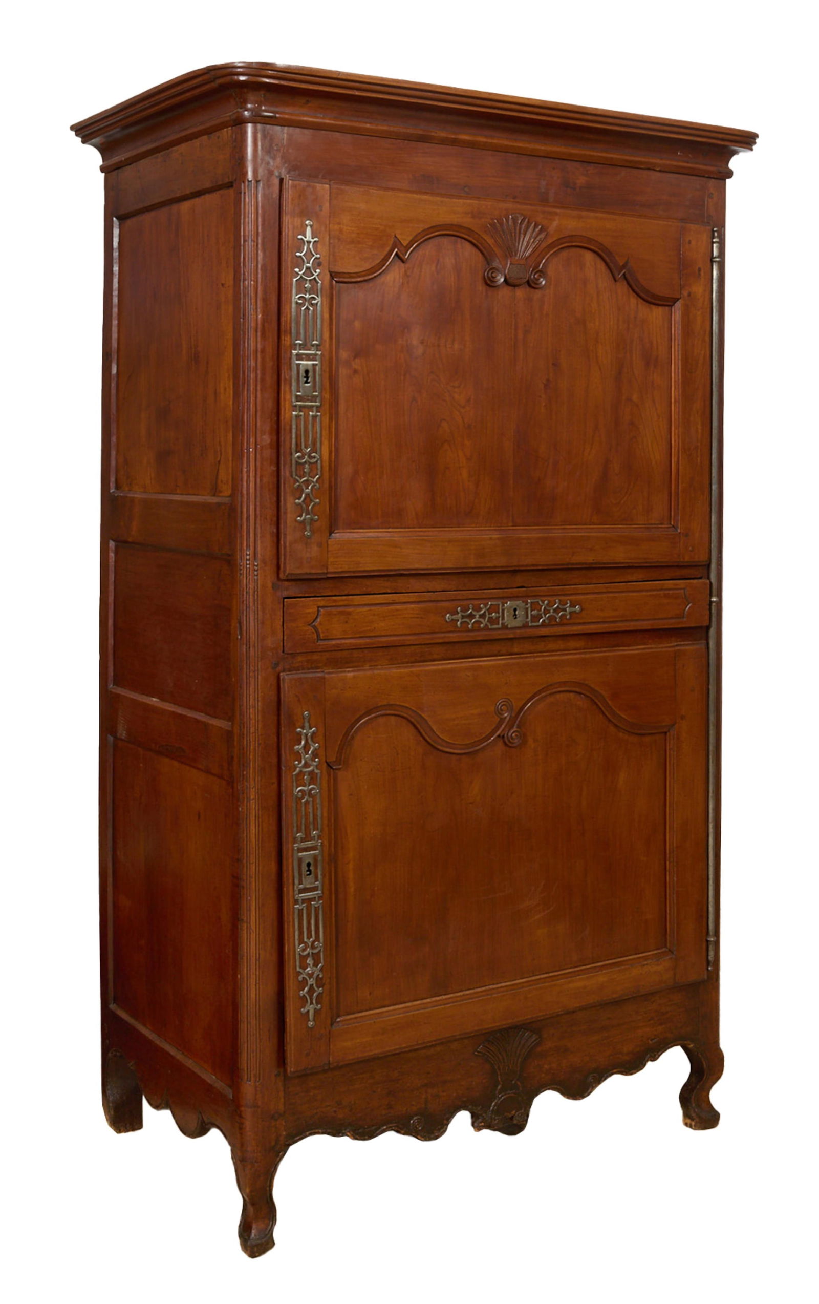 French Louis XV Style Cherry Homme Debout Bonnetiere, late 19th c., H.- 81 in., W.- 45 1/2 in., D.-: French Louis XV Style Cherry Homme Debout Bonnetiere, late 19th c., the stepped coved cornice above two carved panel doors with a shallow drawer between, flanked by fluted stiles, fan carved scrolling