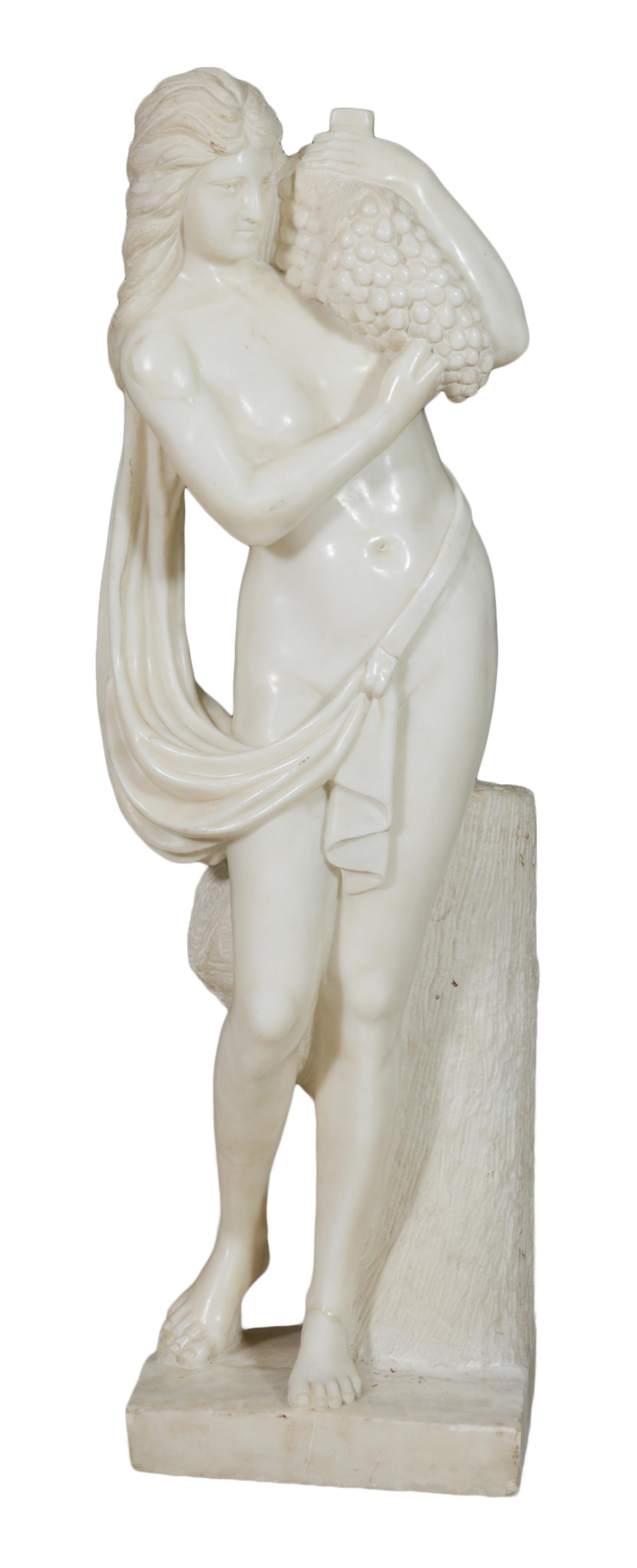 Italian Neoclassical Figural Carved Marble Sculpture of Woman Holding Grapes, 20th c., H.- 42 in.,: Italian Neoclassical Figural Carved Marble Sculpture of Woman Holding Grapes, 20th c., resting on a carved tree stump with base, H.- 42 in., W.- 12 in., D.- 12 in. Provenance: The Estate of Joseph A. 