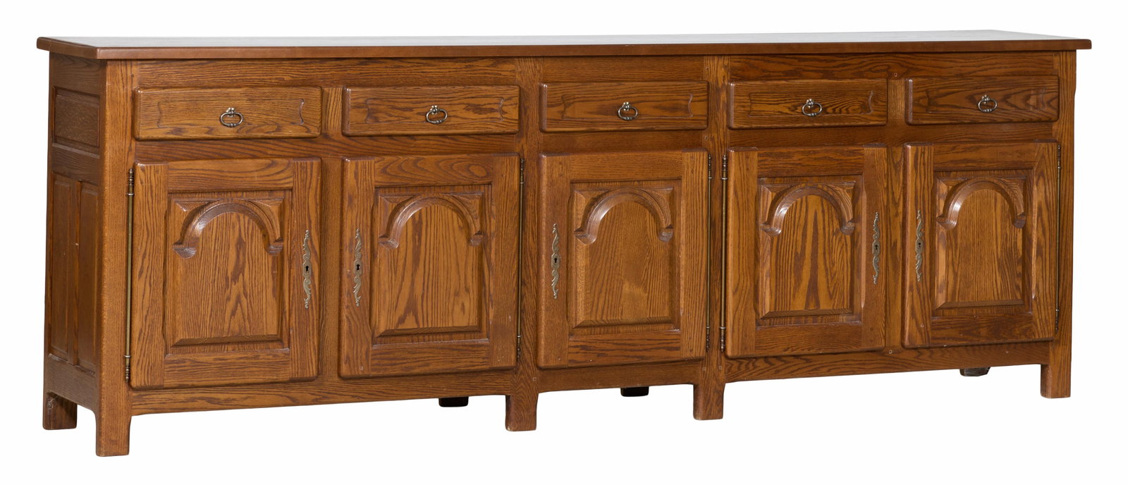 Large French Provincial Oak Enfilade, 20th c., H.- 41 1/2 in., W.- 119 1/4 in., D.- 20 3/4 in.: Large French Provincial Oak Enfilade, 20th c., the long rectangular top over five frieze drawers, five arched raised panel cabinet doors with lozenge spandrels, straight stiles, H.- 41 1/2 in., W.- 11