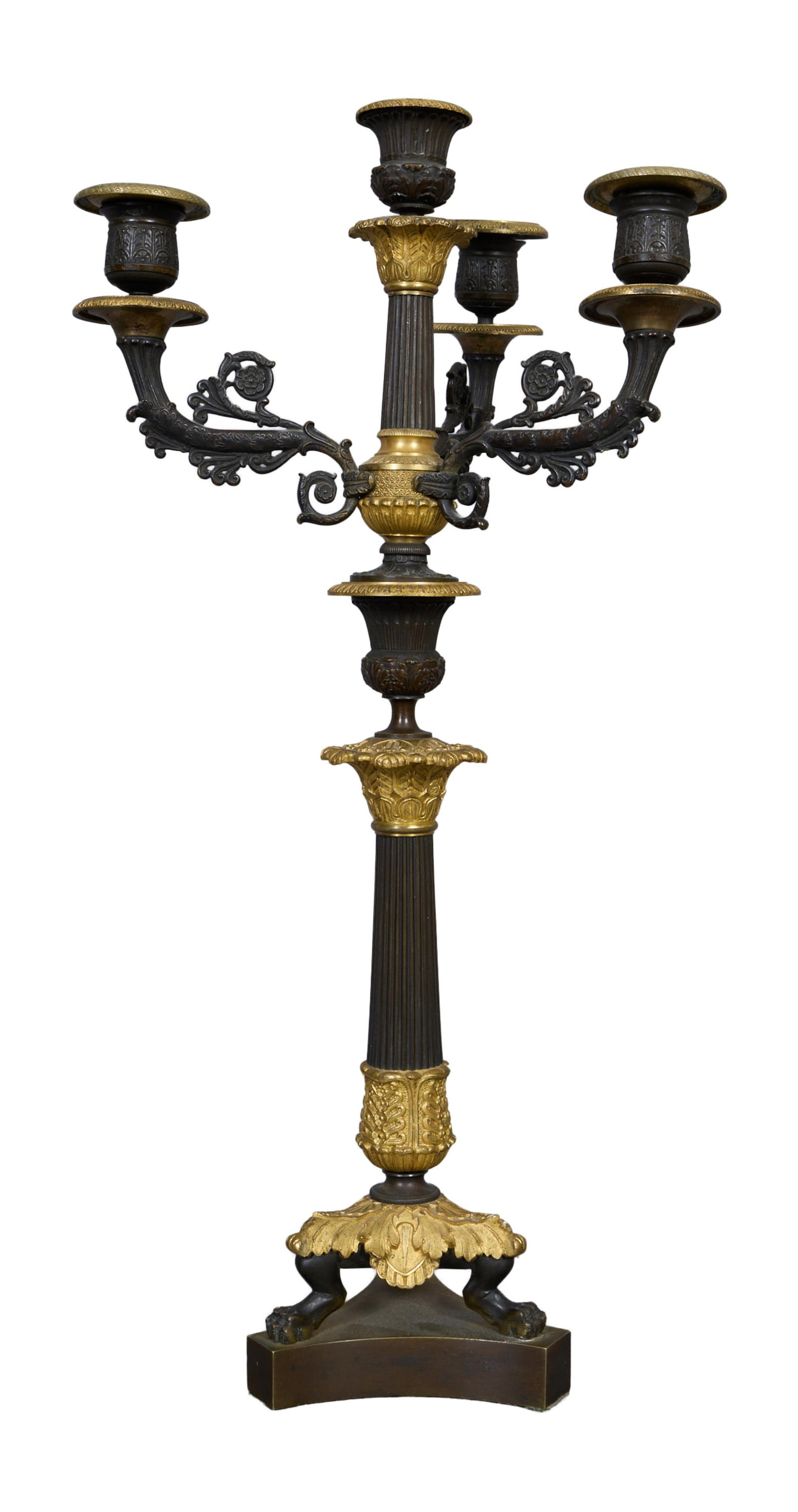 Ebonized and Gilt Bronze Four Light Candelabra, late 19th c., H.- 21 1/2 in., Dia.- 9 1/2 in.: Ebonized and Gilt Bronze Four Light Candelabra, late 19th c., with paw feet, on an integral tripodal base, H.- 21 1/2 in., Dia.- 9 1/2 in. Provenance: Property from the Estate of Murphy A. Bourke, New