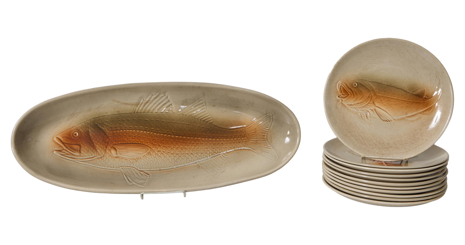 Twelve Piece French Faience Fish Set, by Faience De St. Amand, 20th c., Plates- H.- 1;2 in., Dia.-: Twelve Piece French Faience Fish Set, by Faience De St. Amand, 20th c., consisting of 11 circular plates and an oval platter, depicting different aquatic life, Plates- H.- 1;2 in., Dia.- 10 in.; Platt