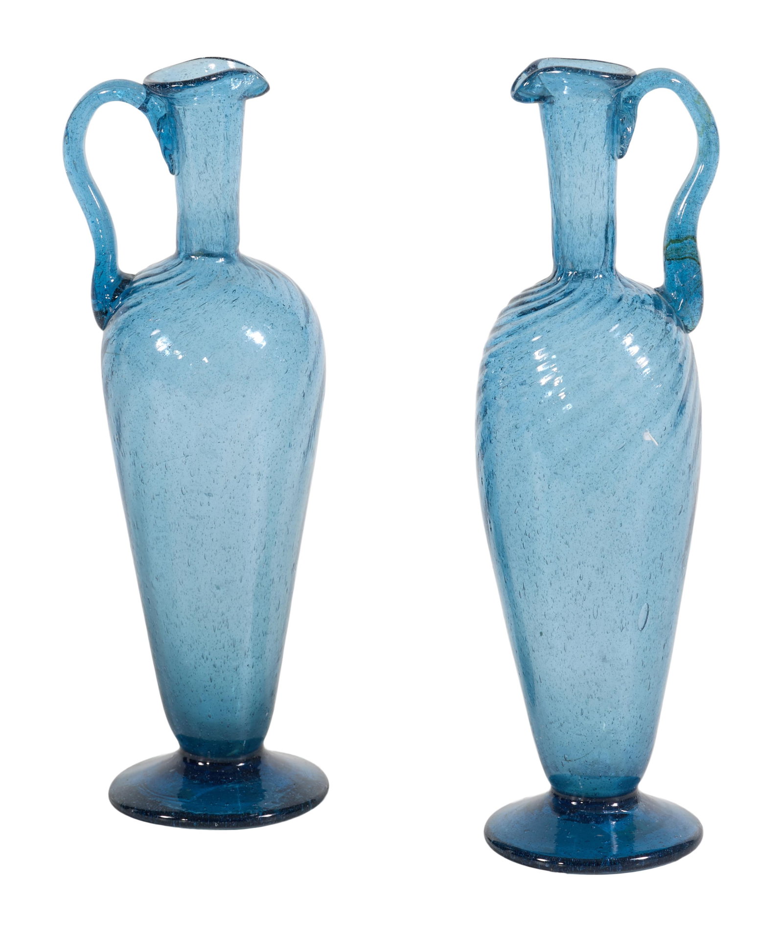 Pair of Tall Blue Hand-Blown Glass Carafes, early 20th c., H.- 9 1/8 in., W.- 3 in., D.- 2 3/4 in.: Pair of Tall Blue Hand-Blown Glass Carafes, early 20th c., H.- 9 1/8 in., W.- 3 in., D.- 2 3/4 in. (2 Pcs.)