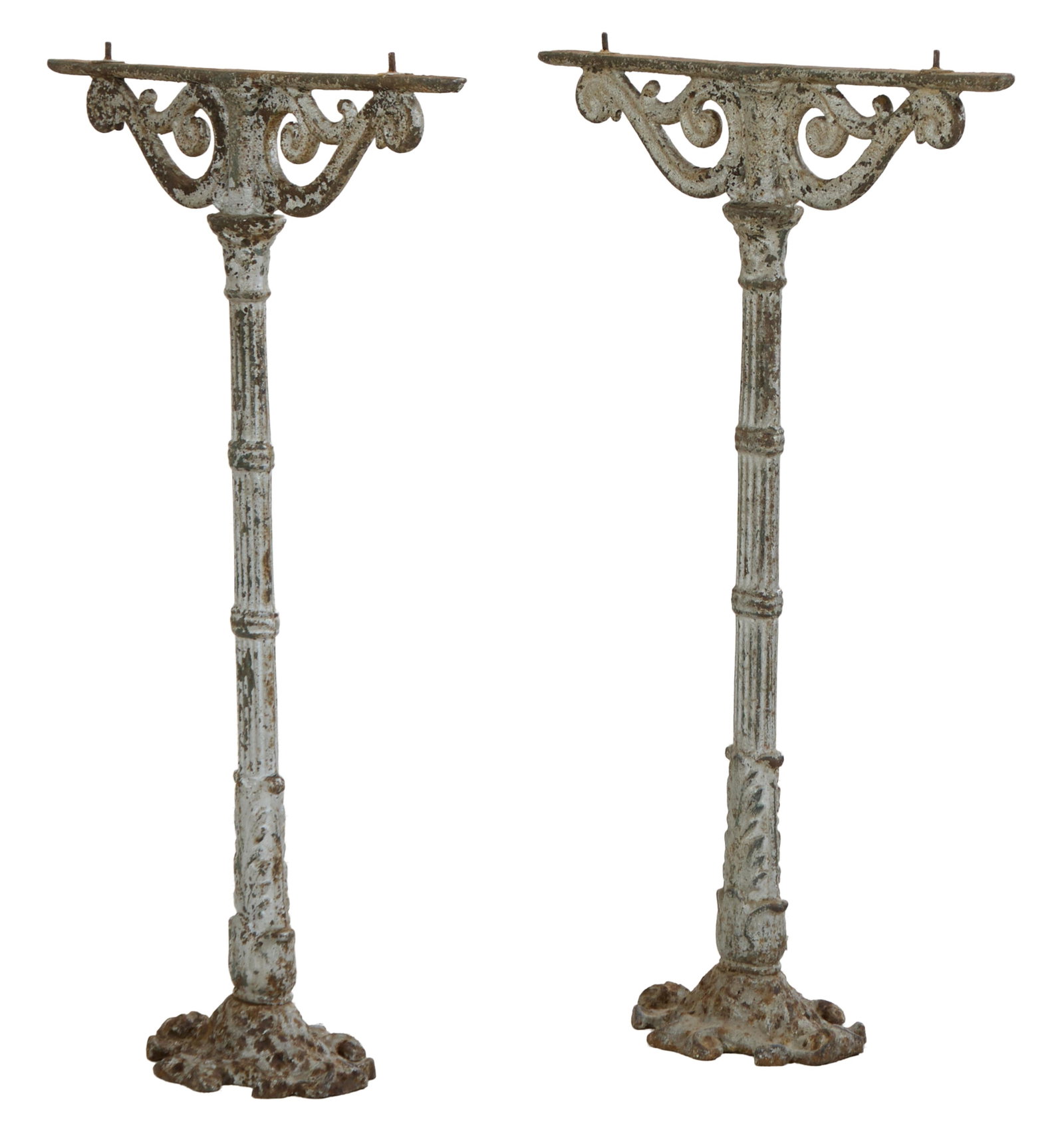 Pair of French Parisian Cast Iron Bistro Table Bases, late 19th c., H.- 27 in., W.- 18 in., D.- 6: Pair of French Parisian Cast Iron Bistro Table Bases, late 19th c., the scrolled supported flat top with stay rods, bound reed standard with foliate bottom, drilled scrolled base, H.- 27 in., W.- 18 i