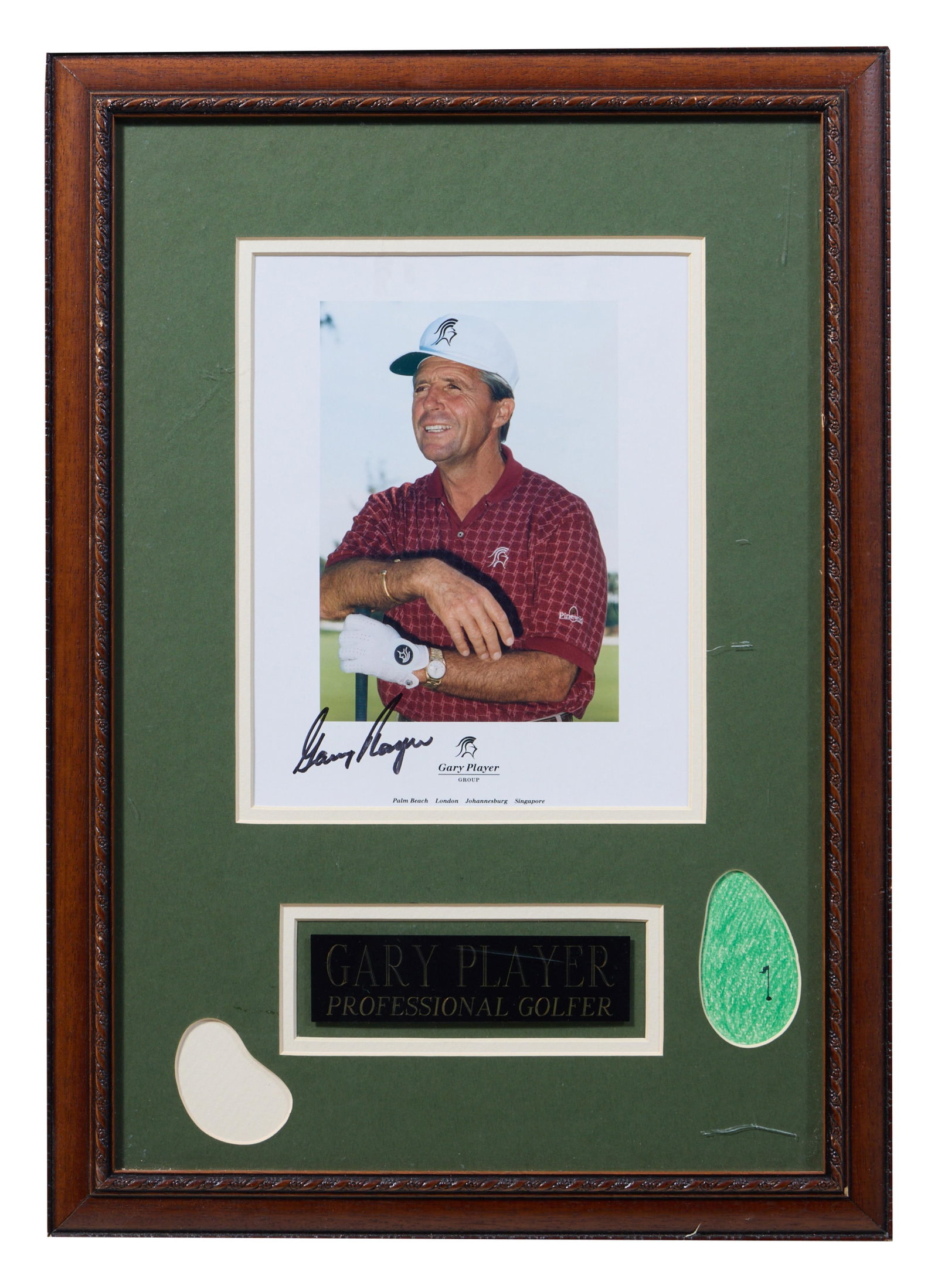Gary Player Autographed Memorabilia, Overall- H.- 20 3/4 in., W.- 14 3/4 in.: Gary Player Autographed Memorabilia, with a signed Gary Player Group photograph and black golfer plaque centered by decorative golf greens, in a wood frame with plexiglass, Overall- H.- 20 3/4 in., W.