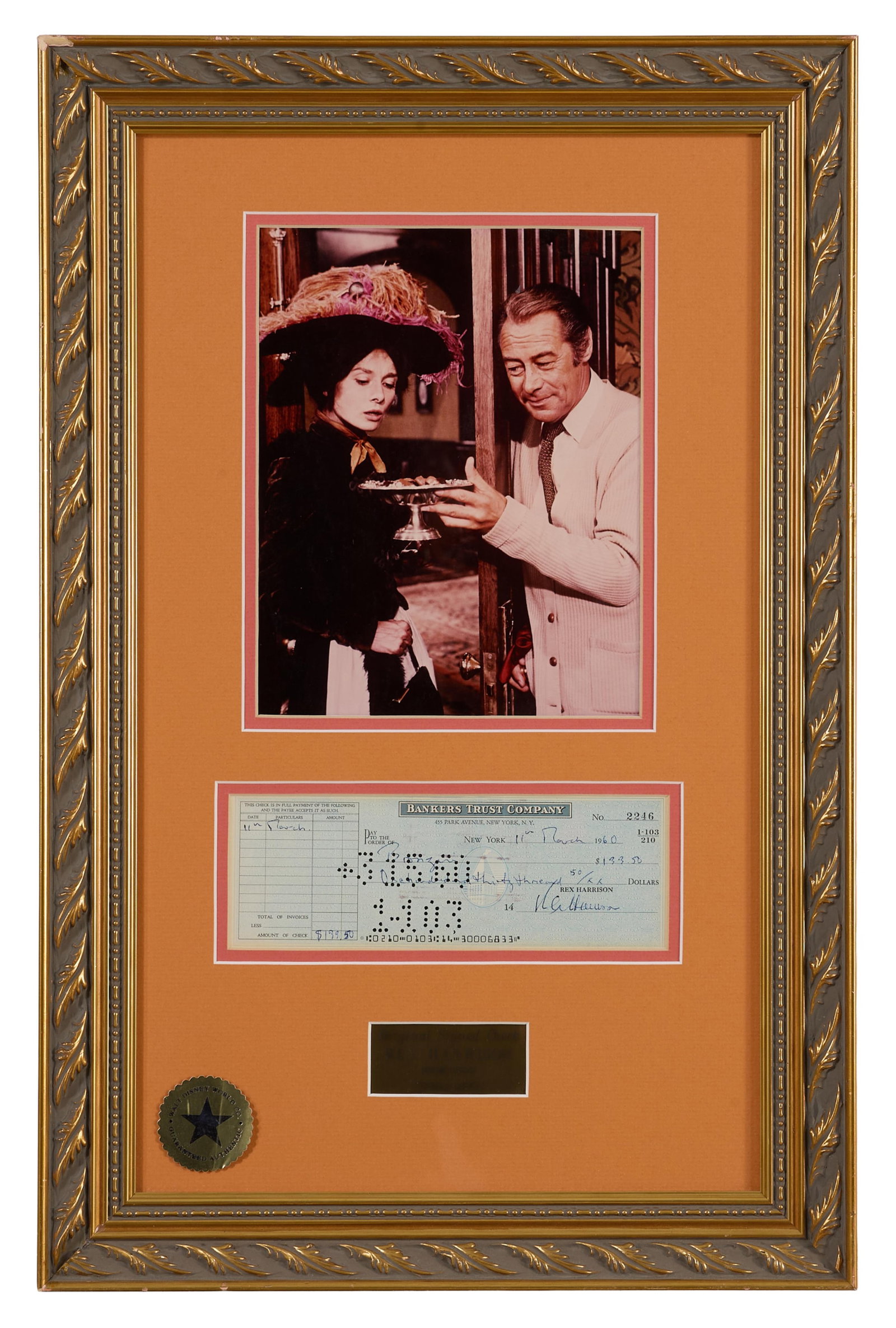 Rex Harrison Autographed Memorabilia, Overall- H.- 23 in., W.- 15 in.: Rex Harrison Autographed Memorabilia, with a 1960 signed check, film still from "My Fair Lady" (1964), and an actor's plaque, presented in a giltwood frame with a Walt Disney certificate of guarantee 