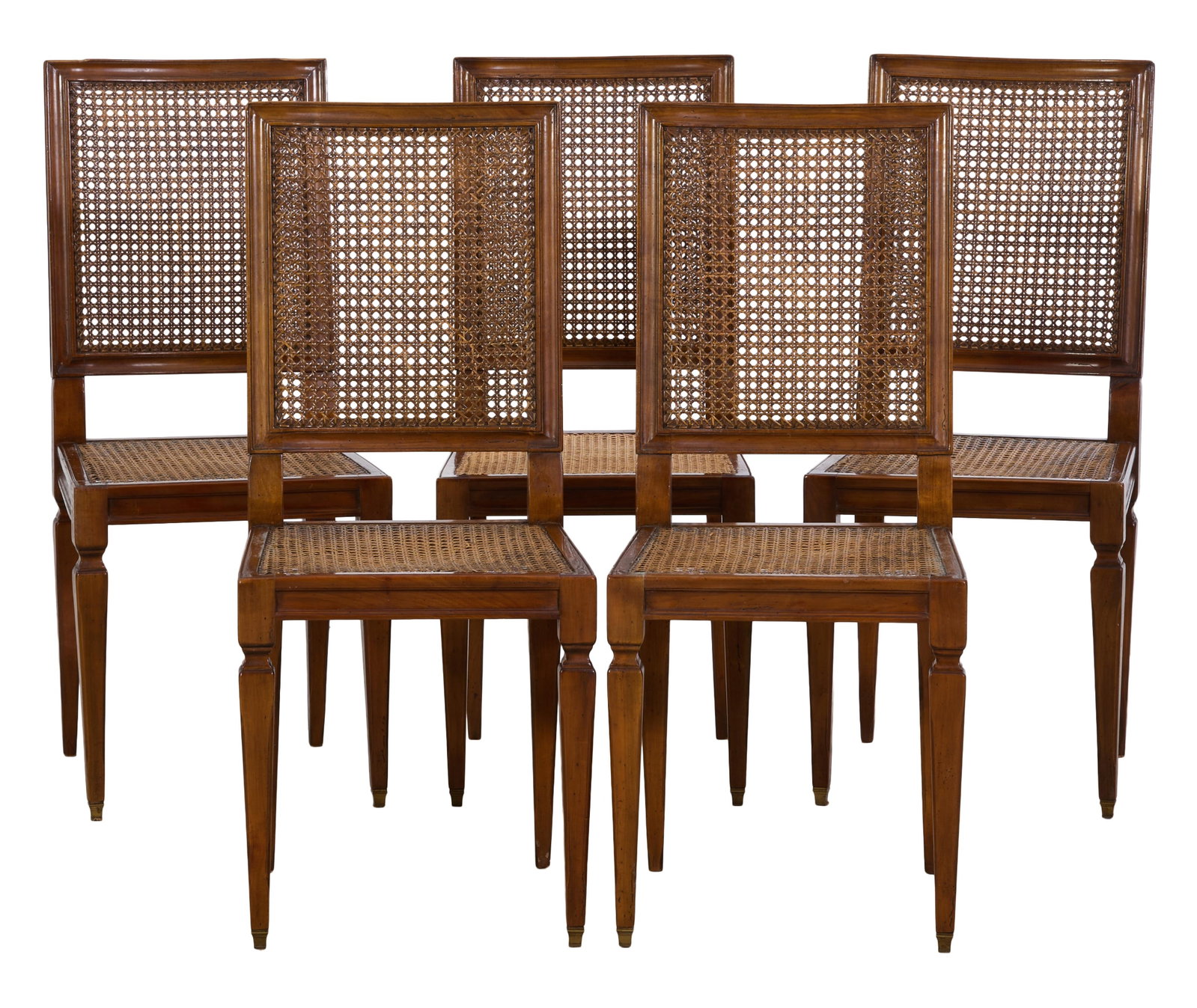 Five French Louis XVI Style Dining Chairs, mid 20th c., Each- H.- 39 1/4 in., W.- 17 1/8 in., D.- 17: Five French Louis XVI Style Dining Chairs, mid 20th c., the moulded caned rectangular backs over caned seats, micro chamfered tapered legs, brass caps, Each- H.- 39 1/4 in., W.- 17 1/8 in., D.- 17 in.