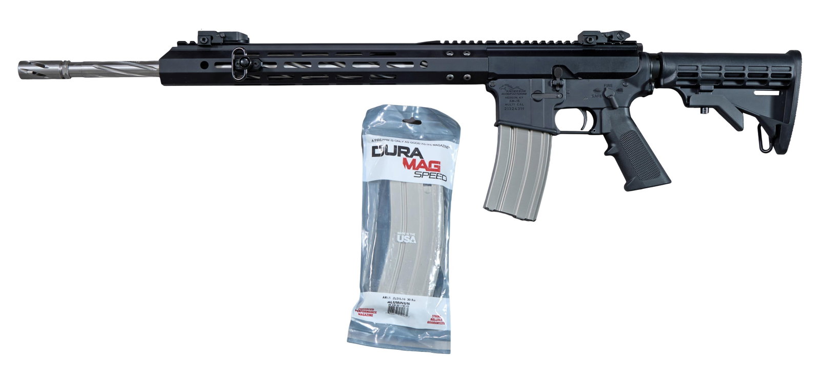 Anderon Manufacturing 5.56 Cal. AM-15 Rifle, L.- Barrel- 20 in., Overall- 37 in.: Anderon Manufacturing 5.56 Cal. AM-15 Rifle, serial #21324319, with extendable/retractable stock, 20 inch stainless steel barrel, 22 inch with flash suppressor, barrel with twisty groove outside to re