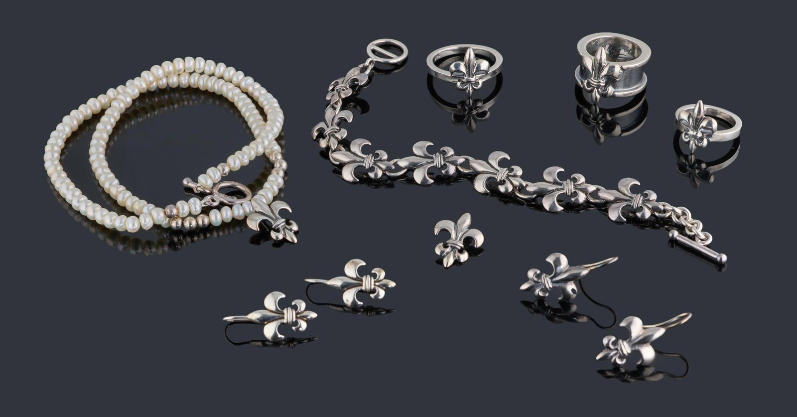 Ten Pieces Sterling Mignon Faget "Fleur de Lis" Collection Set, App. Total Wt.- 66.6 grams; (1 of 1)