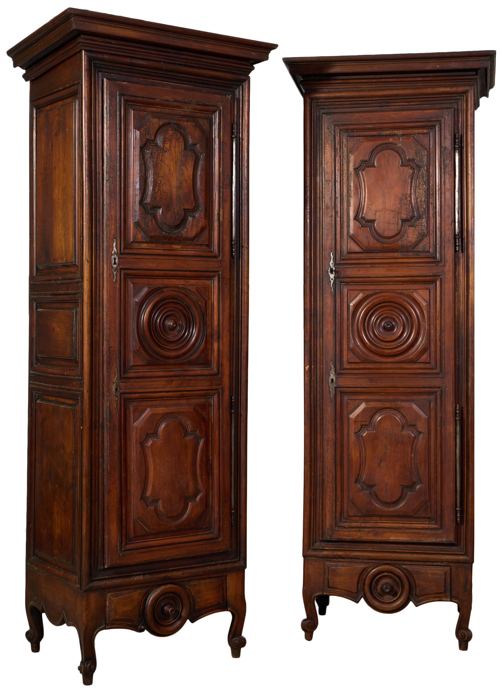 Pair of French Louis XIV Style Walnut Bonnetieres, mid 19th c., Each- H.- 98 in., W.- 35 1/2 in., (1 of 2)
