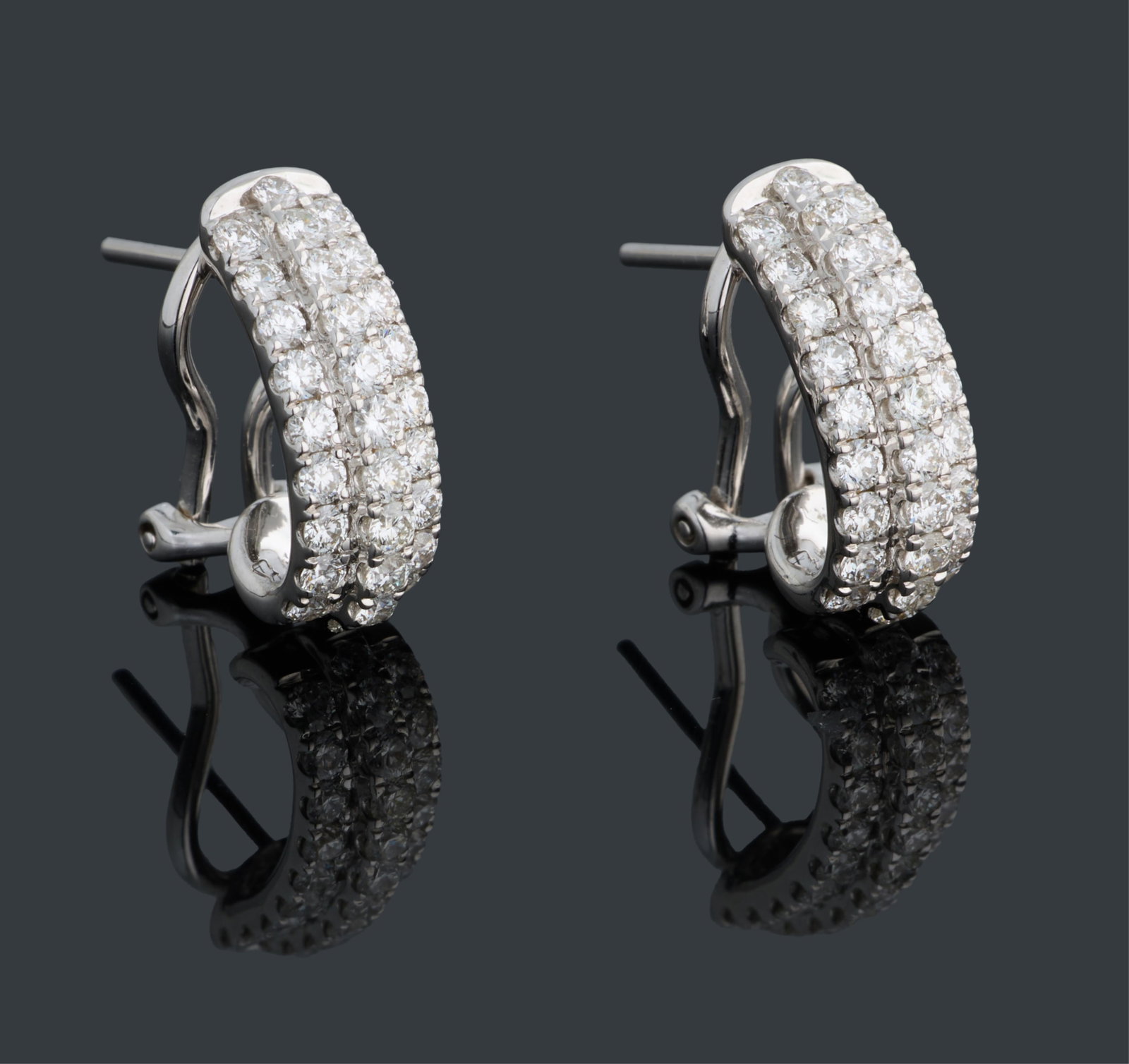 Pair of 18K White Gold Diamond Earrings, App. Total Wt.- 5.1 grams, Each- H.- 5/8 in., W.- 1/4 in.: Pair of 18K White Gold Diamond Earrings, mounted with approximately 1.45 carats total weight diamonds, omega clips, App. Total Wt.- 5.1 grams, Each- H.- 5/8 in., W.- 1/4 in. (2 Pcs.) Please Note: All 