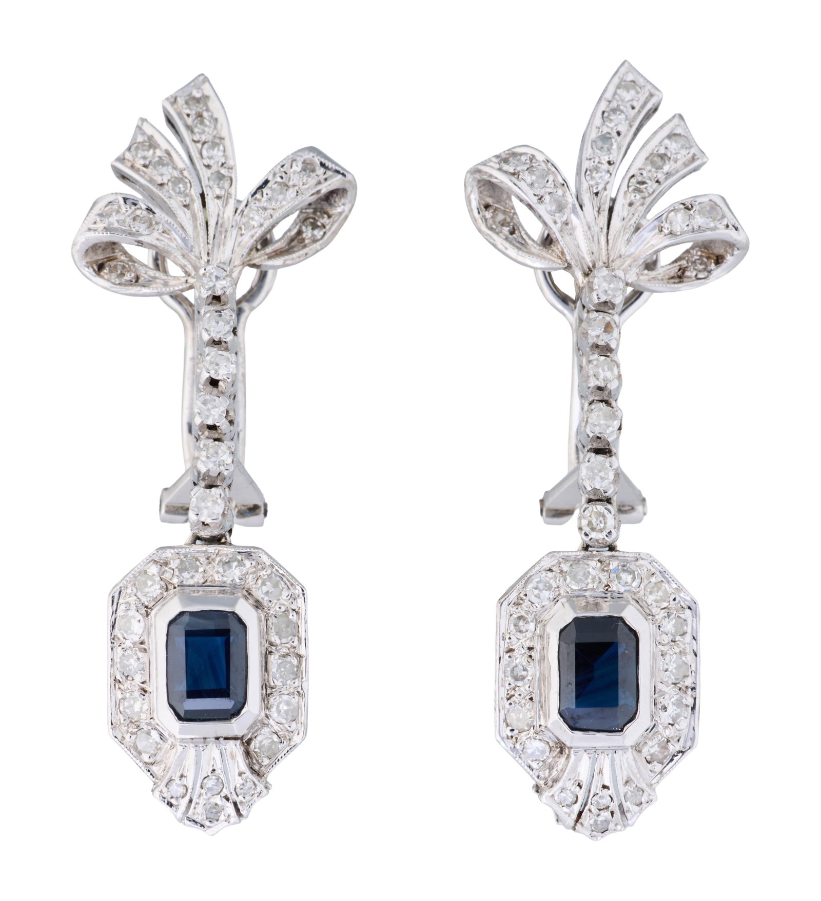 Pair of 14K White Gold Diamond and Sapphire Drop Earrings, App. Total Diamond Wt.- 1.50 carats; App.: Pair of 14K White Gold Diamond and Sapphire Drop Earrings, the approximately 2.00 carat total weight emerald cut sapphires within aproned octagonal surrounds, surmounted by articulated diamond links, 